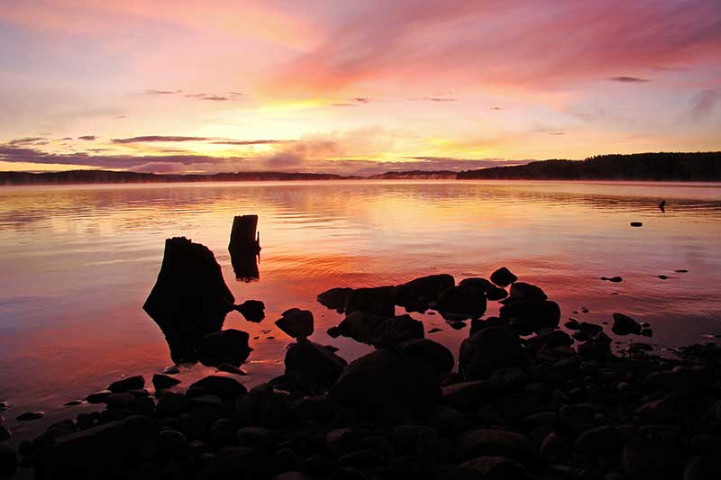 photo of sunrise during the golden hour over Campbell Lake at Fir Grove Campground