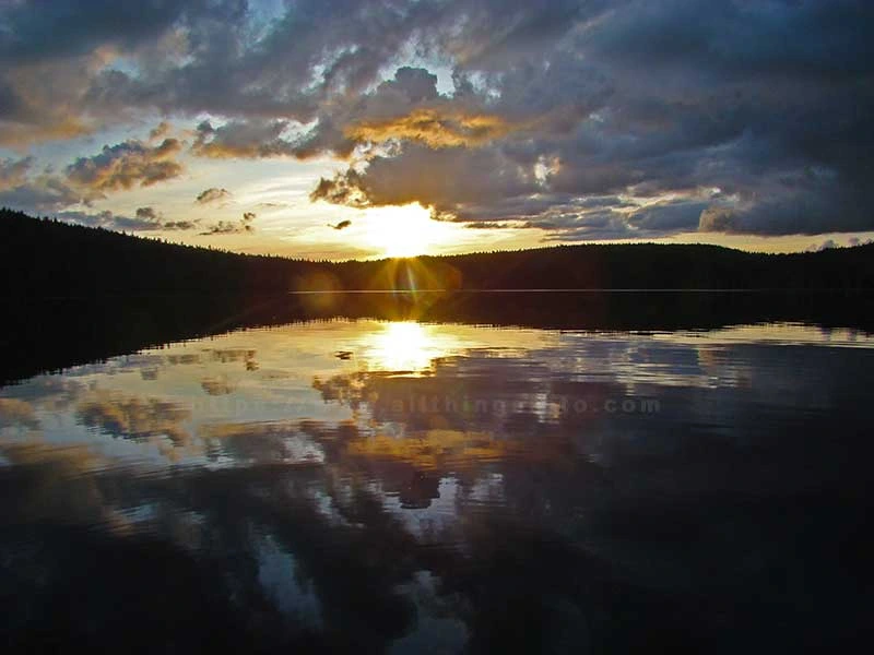 stunning photo of sunset over Merrill Lake on Vancouver Island.