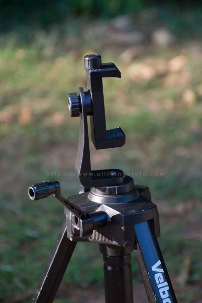 photo of using a smartphone tripod clip attached to a tripod for excellent stabilization.