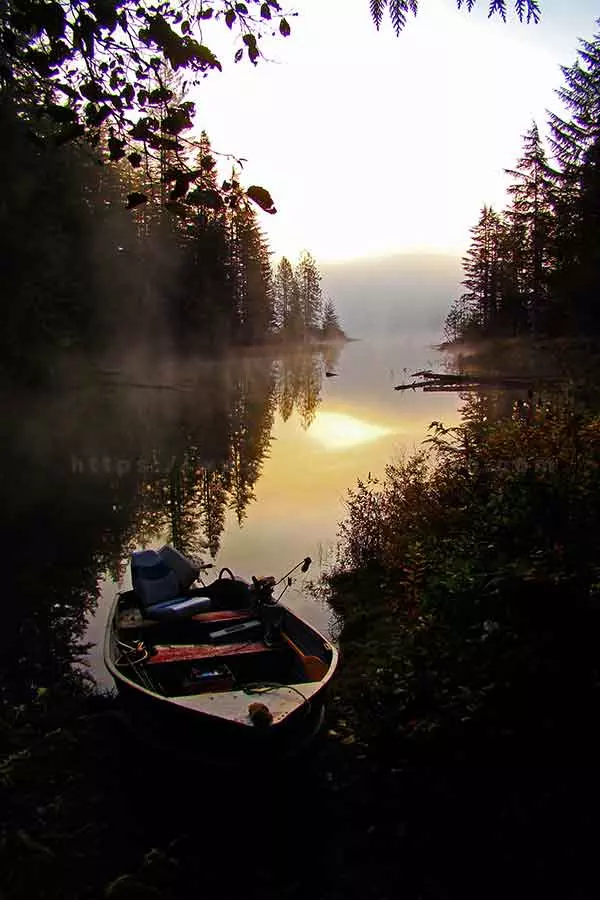 photography's leading lines are used in this photo to show the path to open water where the boater came from.